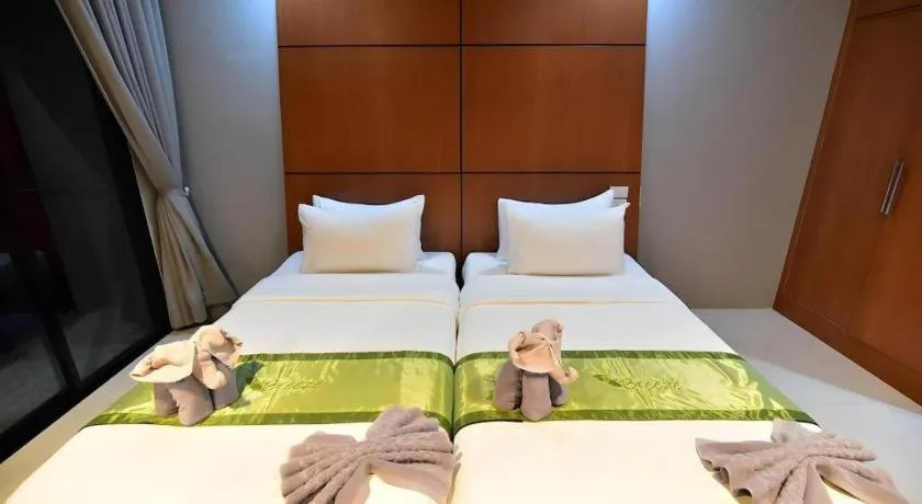 Bed in The Breeze Lipe Resort