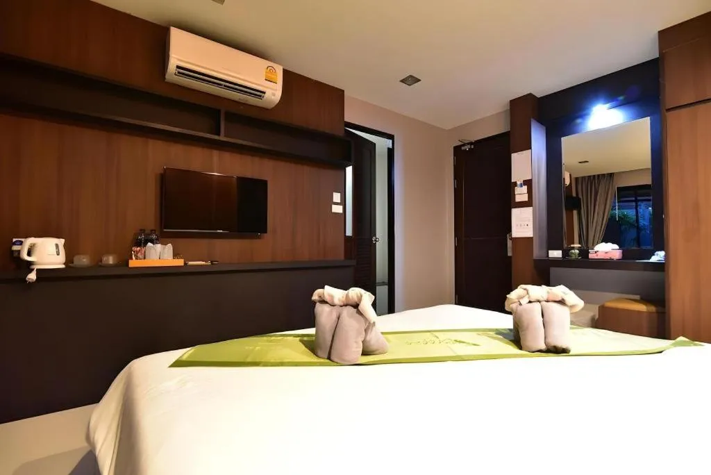 Bed in The Breeze Lipe Resort