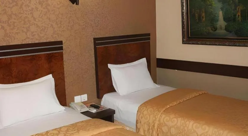 Bed in Hotel Menara Lexus