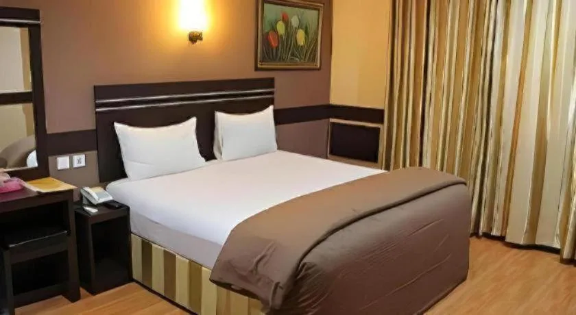 Bed in Hotel Menara Lexus