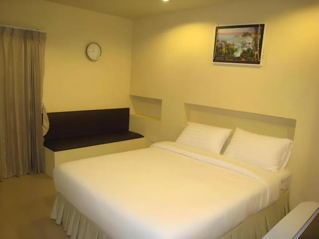 Bed in C2 Residence Hotel