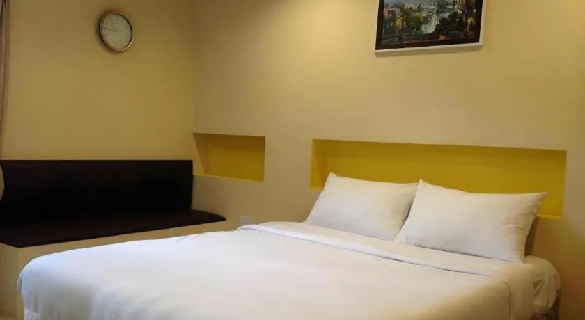 Bed in C2 Residence Hotel