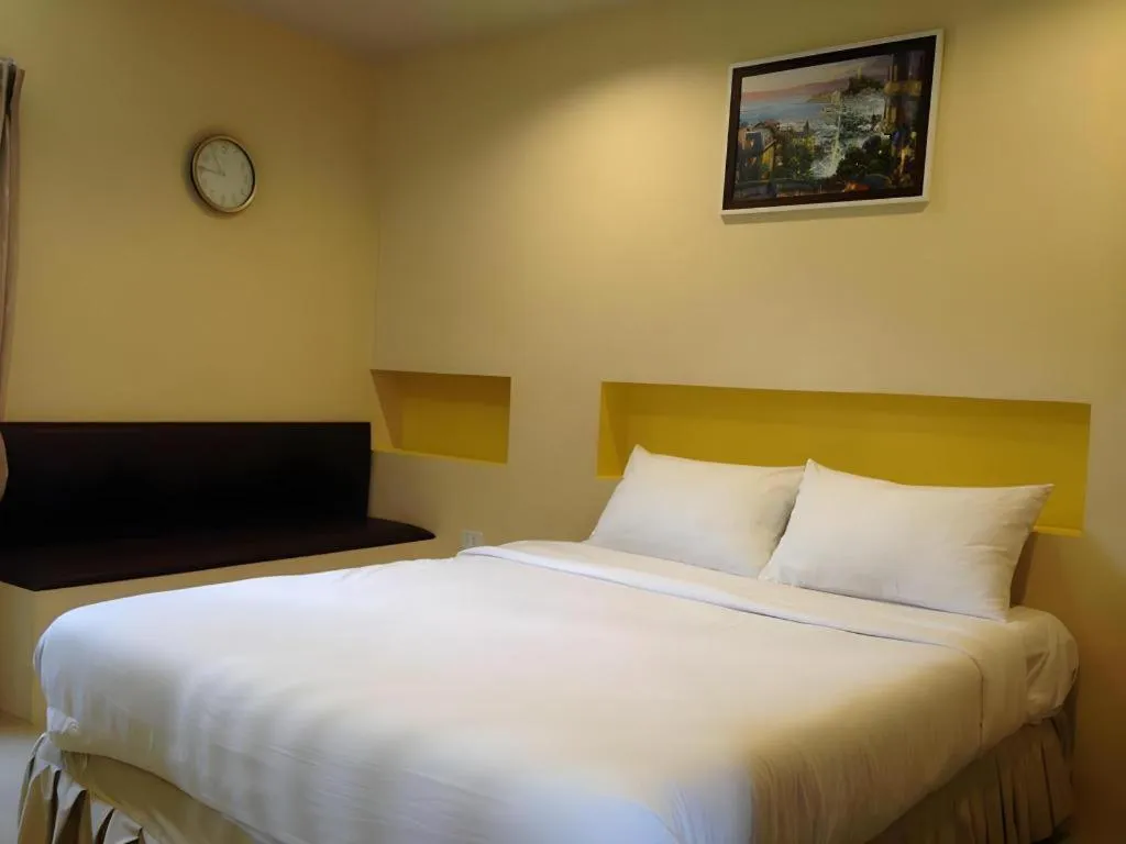 Bed in C2 Residence Hotel