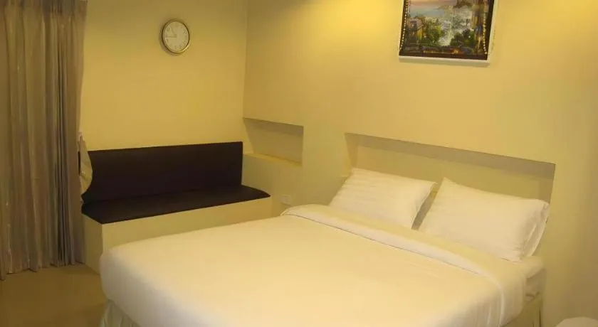 Bed in C2 Residence Hotel