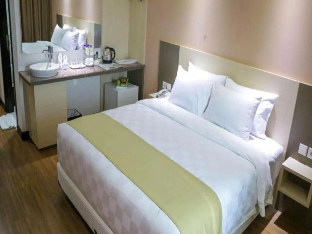 Bed in Dalton Hotel Makassar