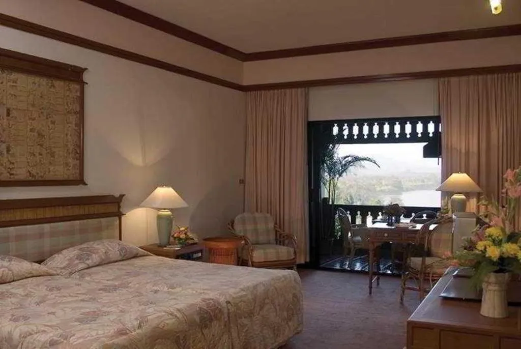 Bed in Imperial Golden Triangle Resort