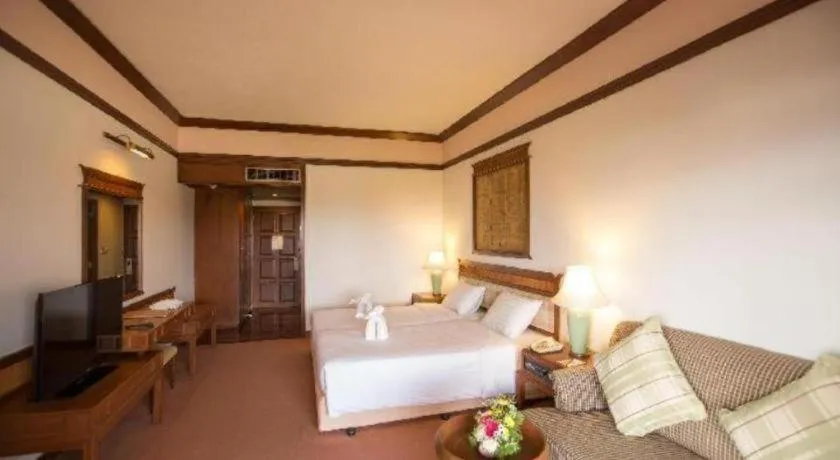 Bed in Imperial Golden Triangle Resort