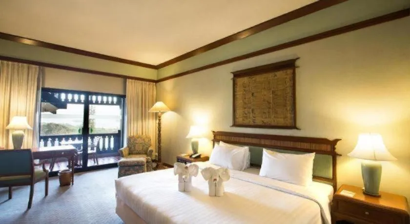 Bed in Imperial Golden Triangle Resort