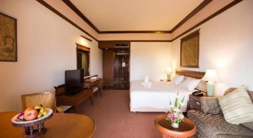 Bed in Imperial Golden Triangle Resort