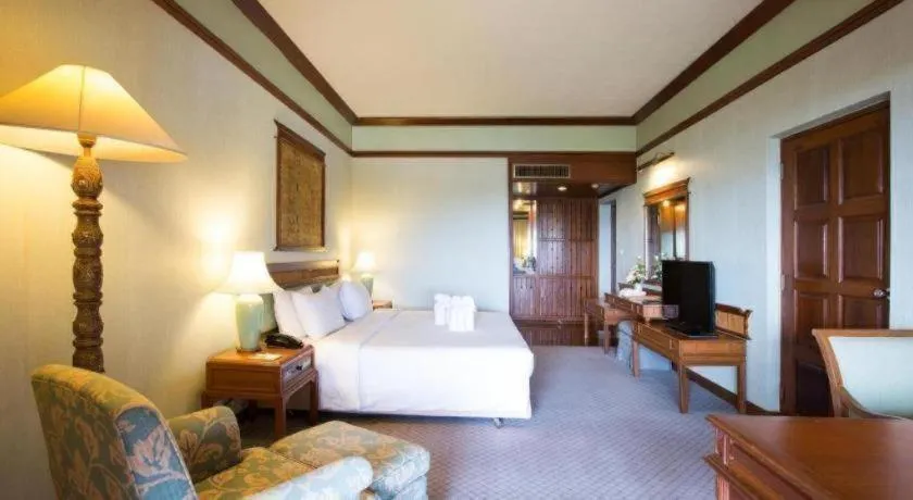 Bed in Imperial Golden Triangle Resort