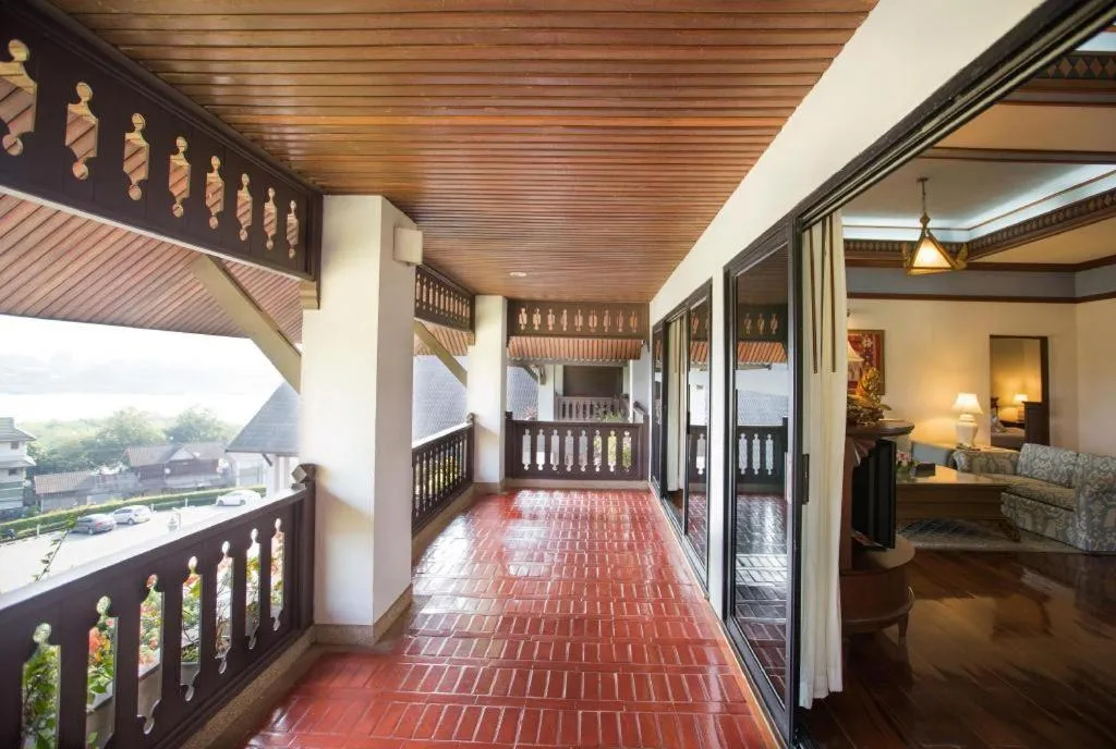 Bed in Imperial Golden Triangle Resort