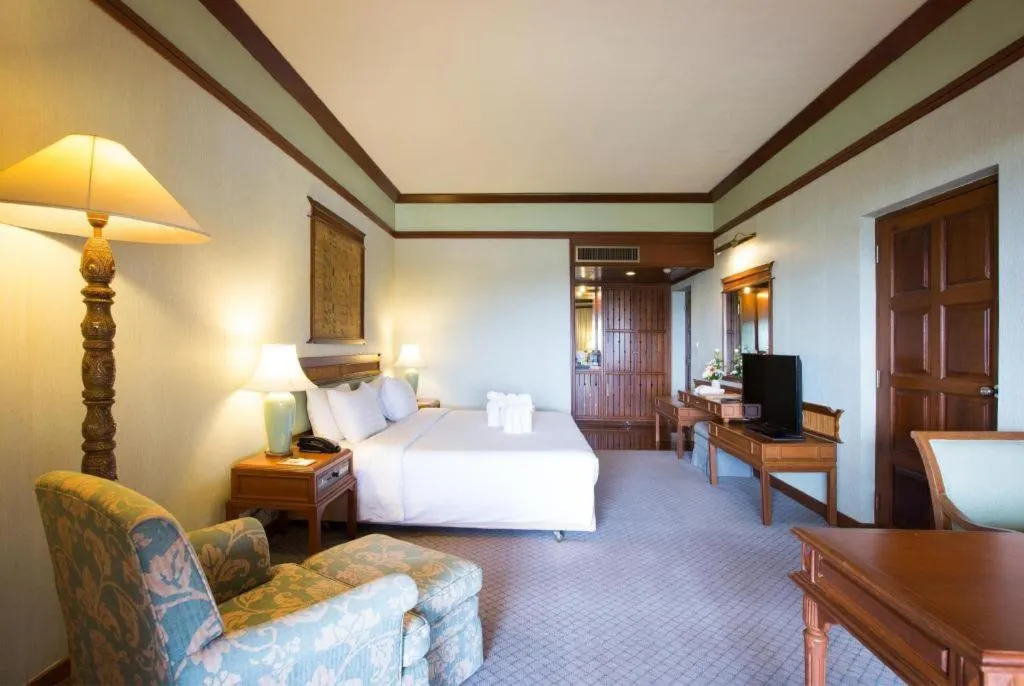 Bed in Imperial Golden Triangle Resort