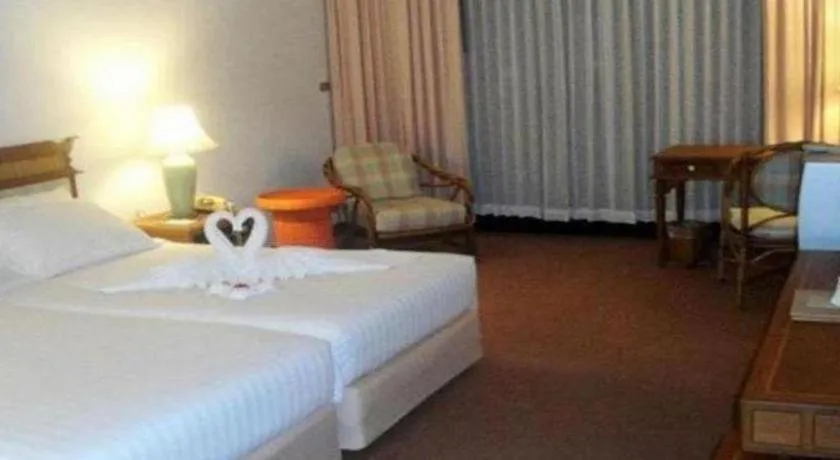 Bed in Imperial Golden Triangle Resort