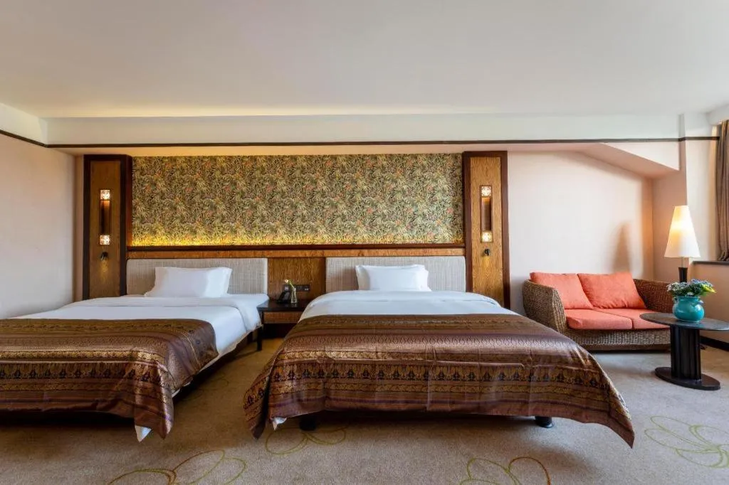 Bed in Riyuegu Hotsprings Resort