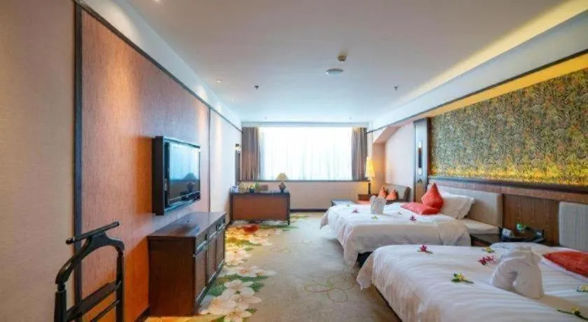 Bed in Riyuegu Hotsprings Resort