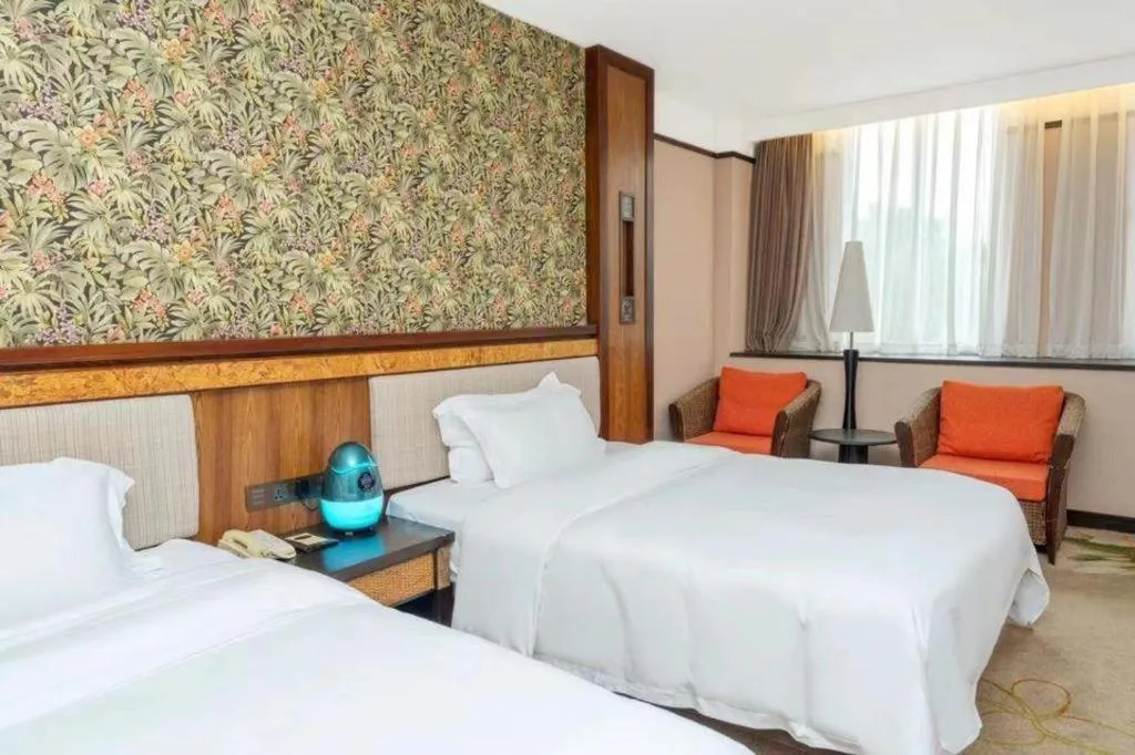 Bed in Riyuegu Hotsprings Resort