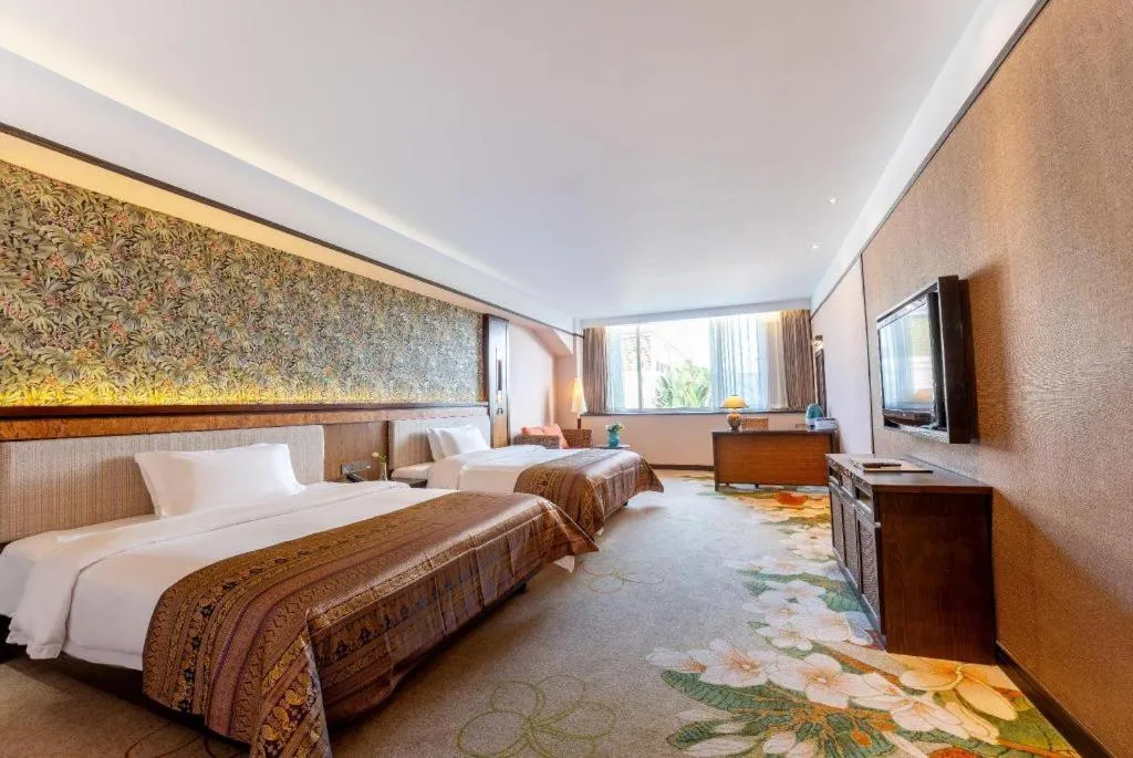 Bed in Riyuegu Hotsprings Resort