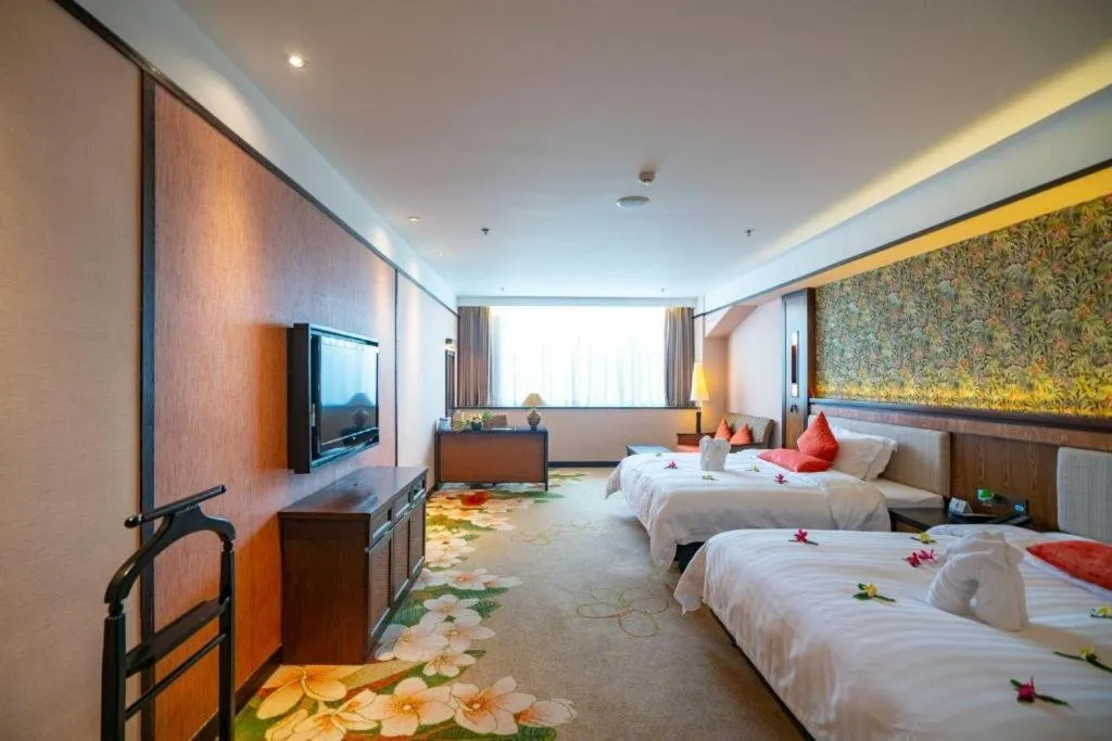 Bed in Riyuegu Hotsprings Resort