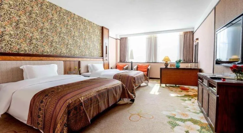 Bed in Riyuegu Hotsprings Resort