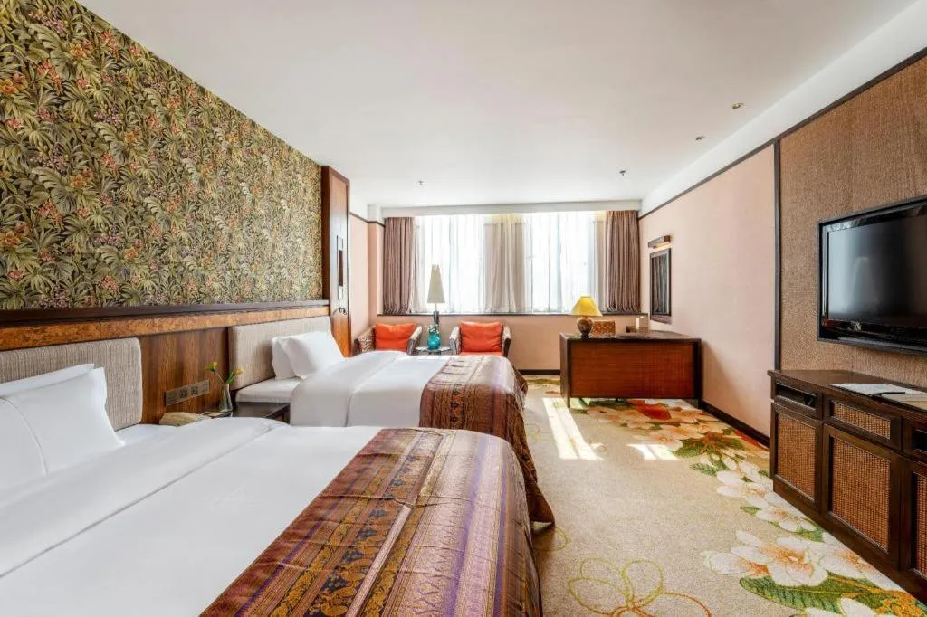 Bed in Riyuegu Hotsprings Resort