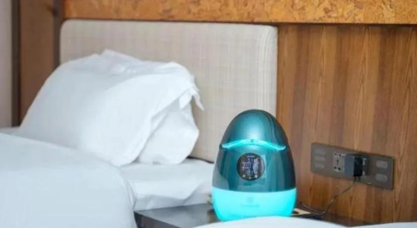 Bed in Riyuegu Hotsprings Resort