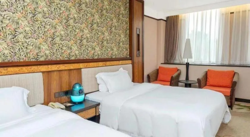 Bed in Riyuegu Hotsprings Resort