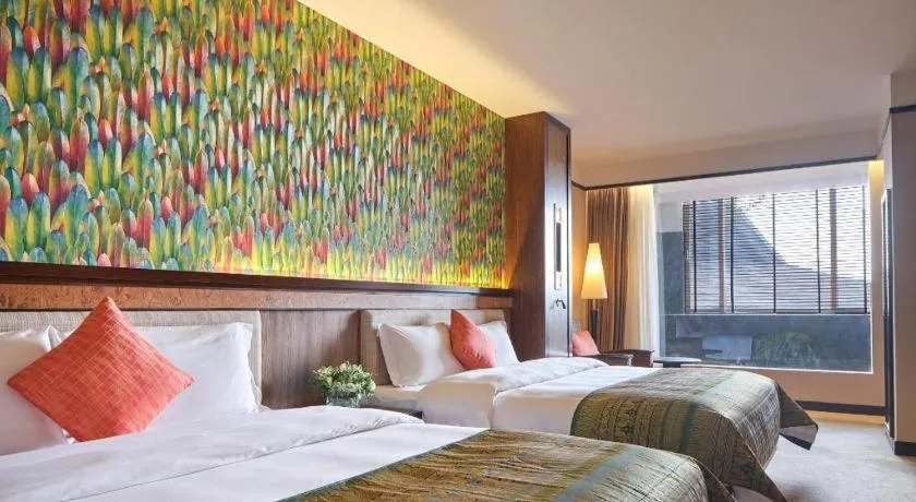 Bed in Riyuegu Hotsprings Resort