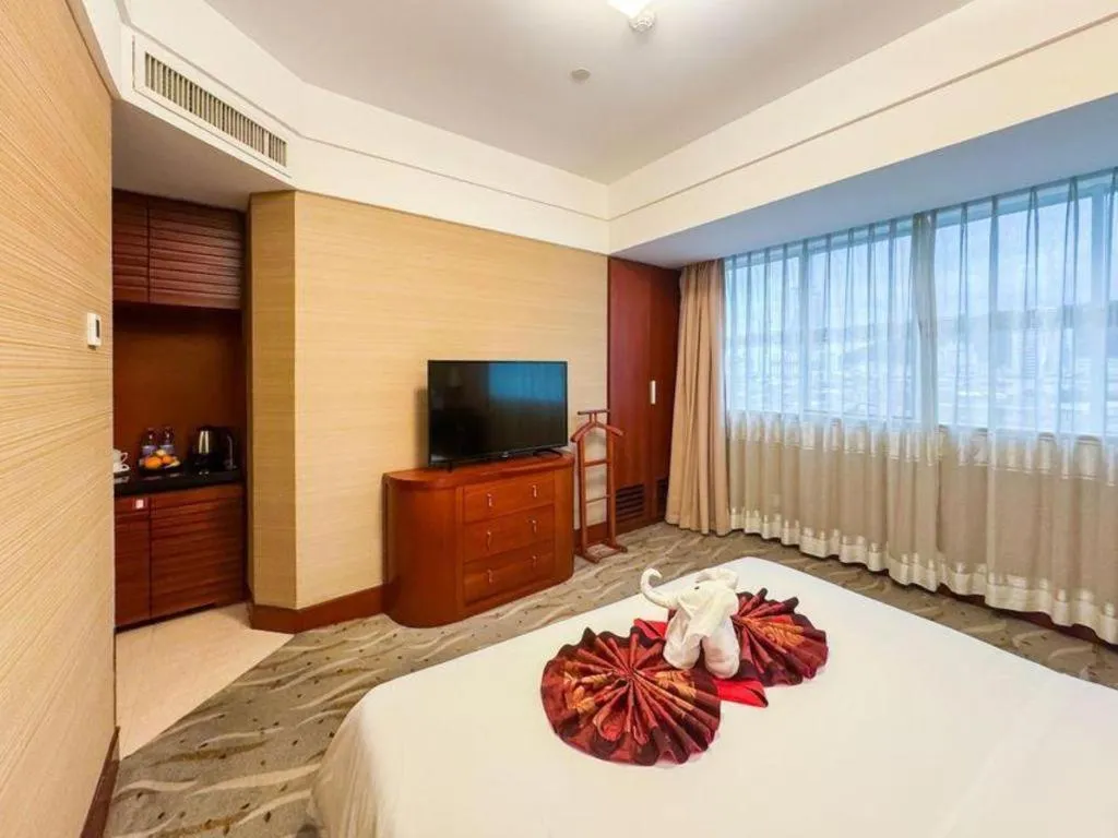 Bed in Xiamen Jingmin Central Hotel