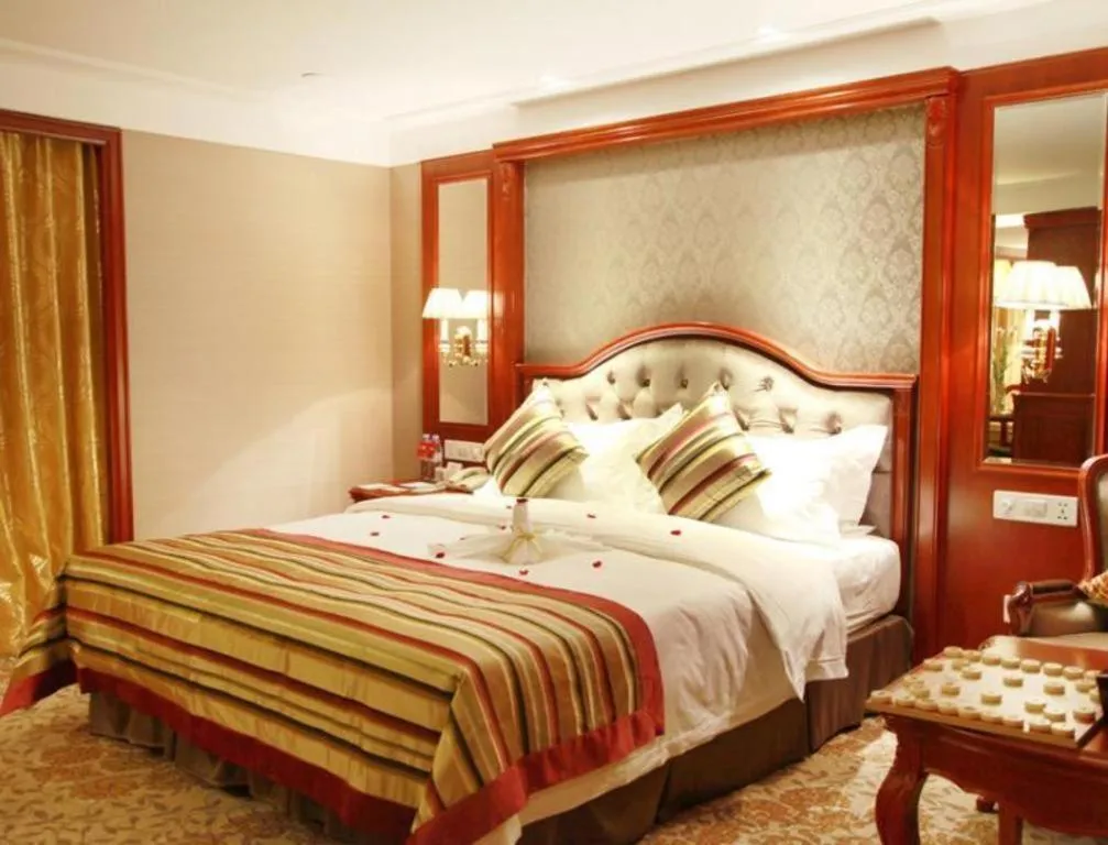 Bed in Xiamen Jingmin Central Hotel