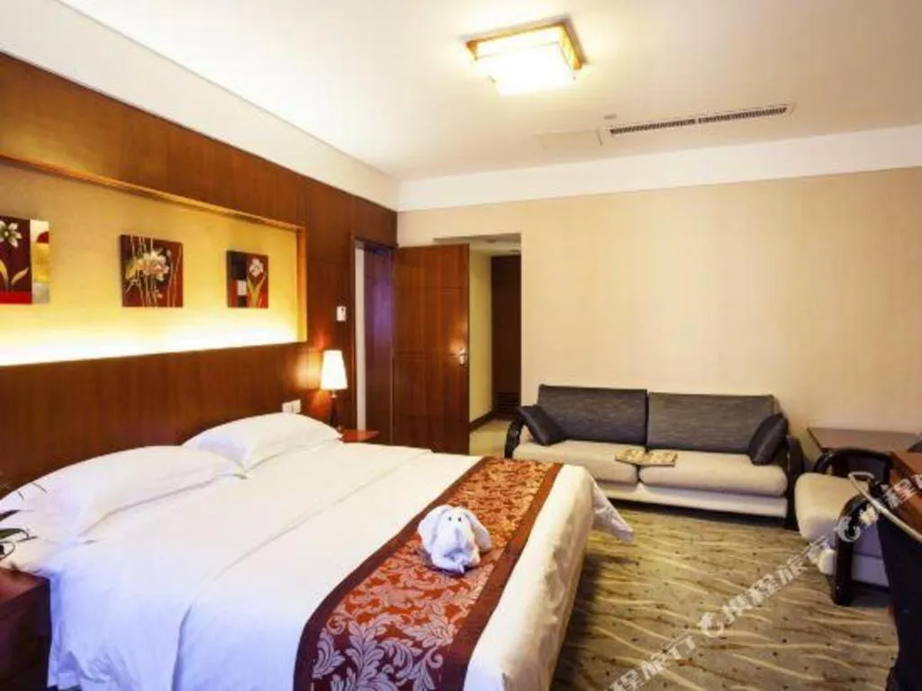 Bed in Xiamen Jingmin Central Hotel