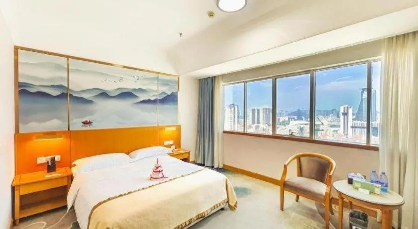 Bed in Xiamen Jingmin Central Hotel