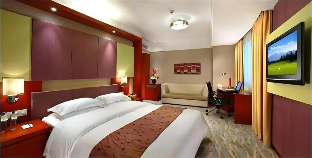 Bed in Xiamen Jingmin Central Hotel