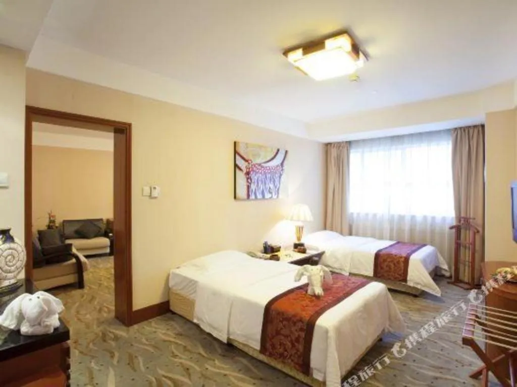 Bed in Xiamen Jingmin Central Hotel