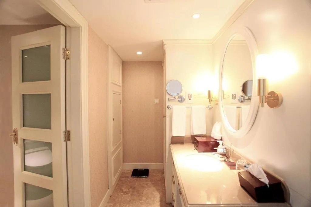 Bed in Xiamen Jingmin Central Hotel