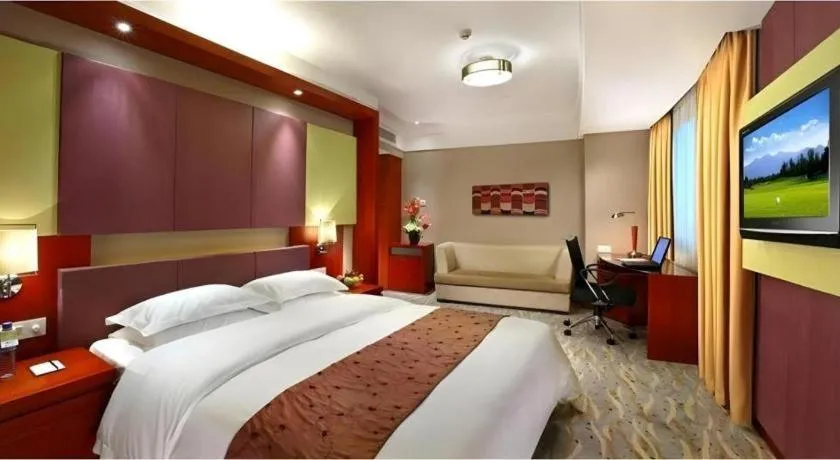Bed in Xiamen Jingmin Central Hotel