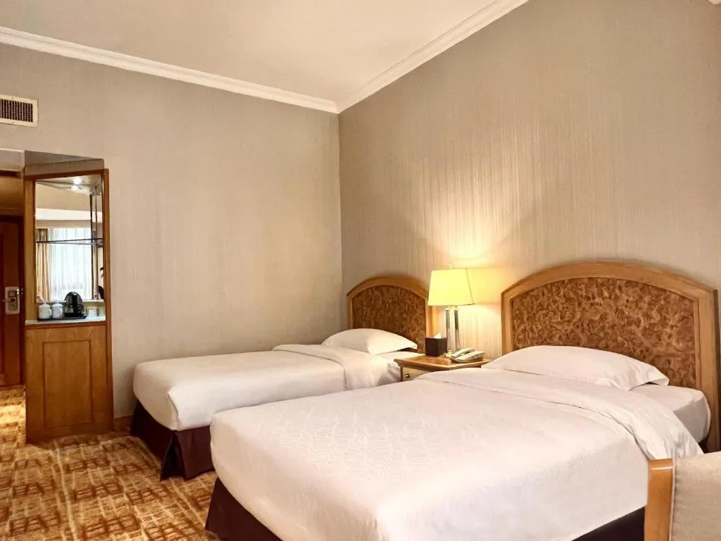 Bed in Century Plaza Hotel