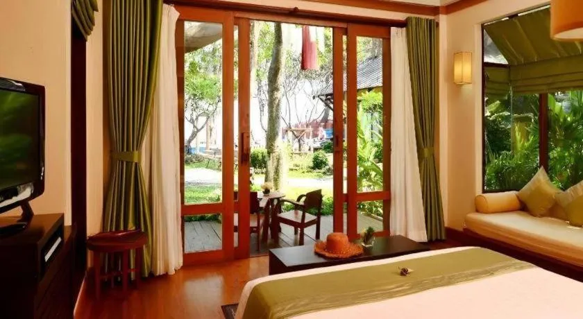 Bed in Baan Talay Dao Resort