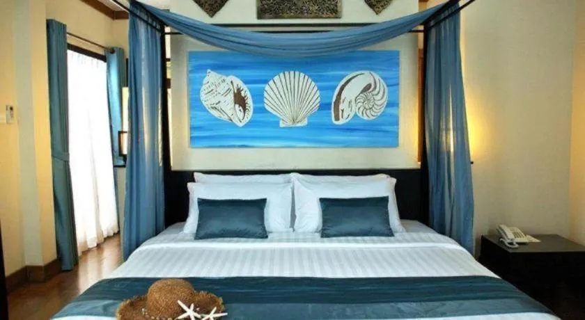 Bed in Baan Talay Dao Resort