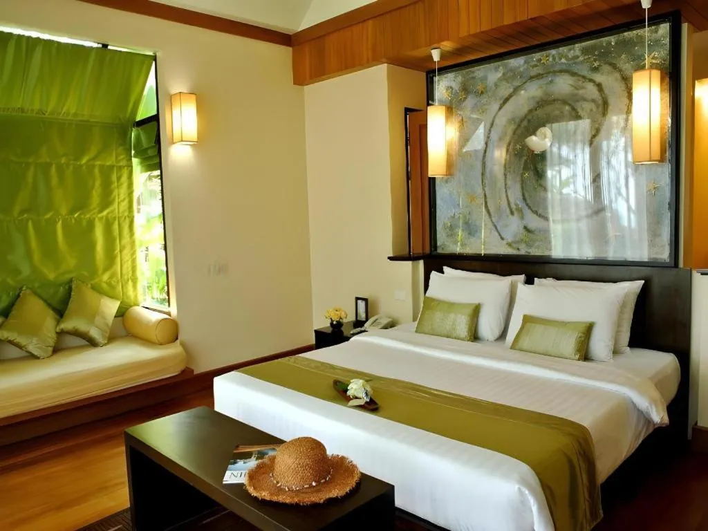 Bed in Baan Talay Dao Resort