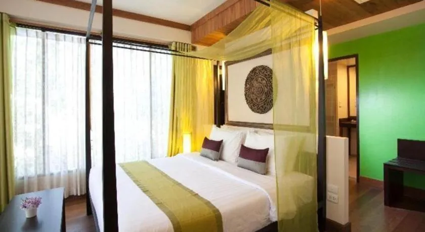 Bed in Baan Talay Dao Resort