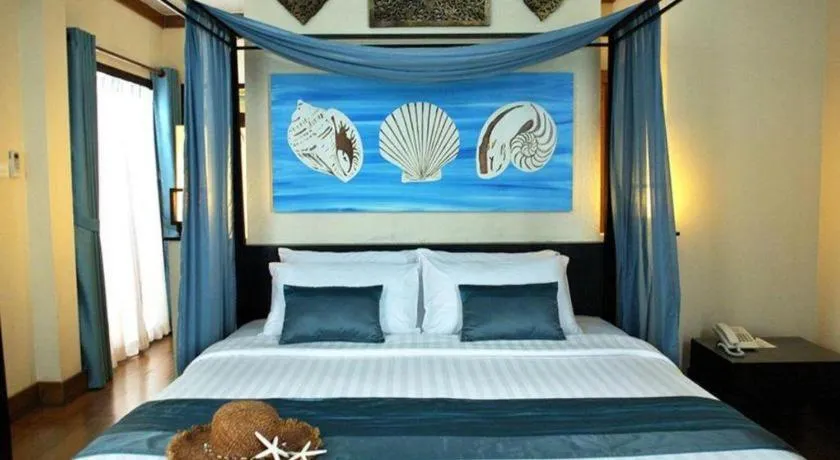 Bed in Baan Talay Dao Resort