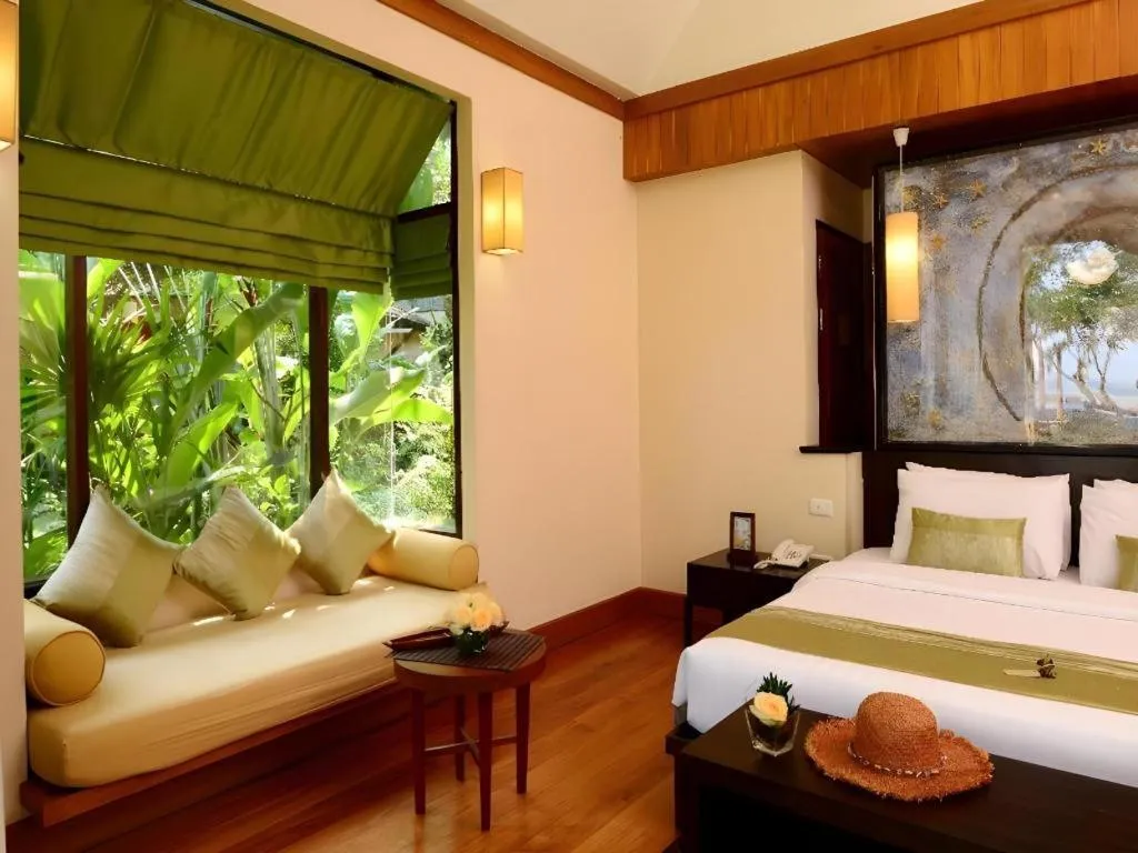 Bed in Baan Talay Dao Resort