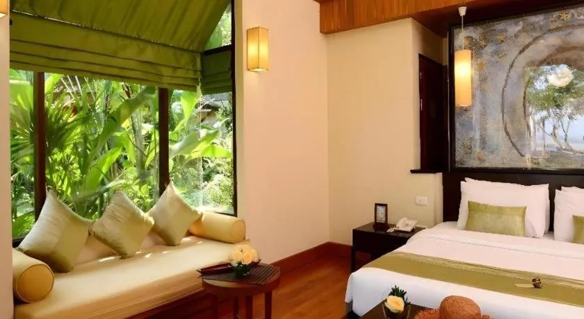 Bed in Baan Talay Dao Resort