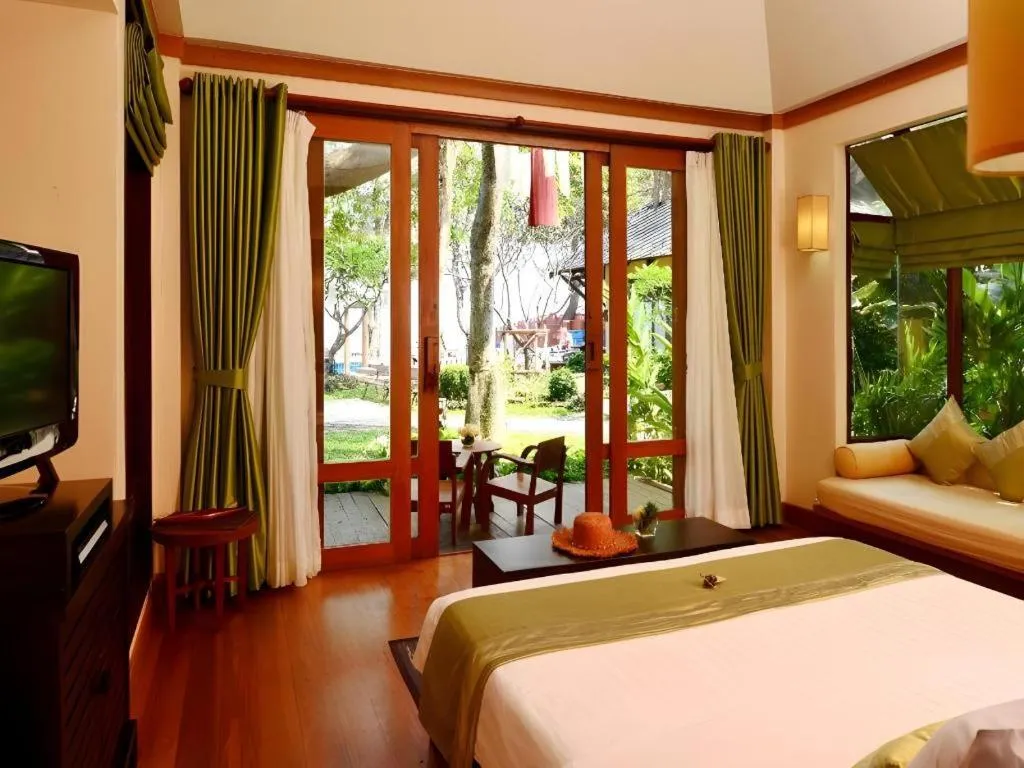 Bed in Baan Talay Dao Resort