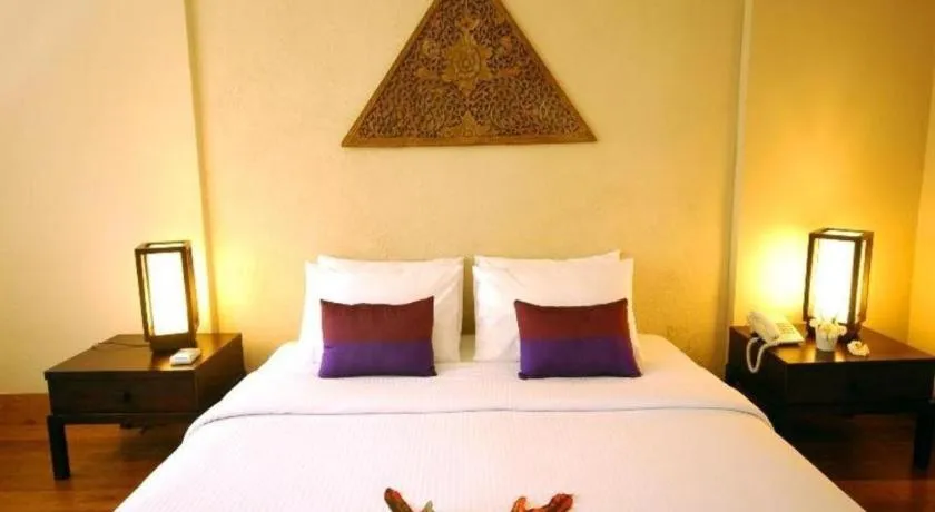 Bed in Baan Talay Dao Resort