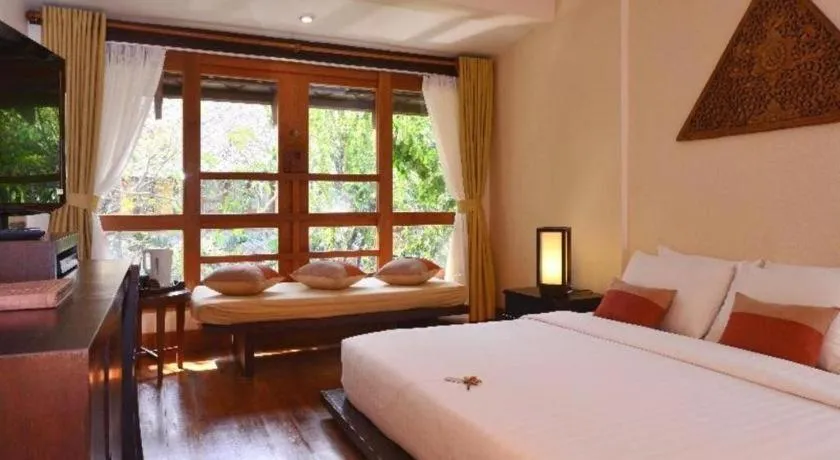 Bed in Baan Talay Dao Resort