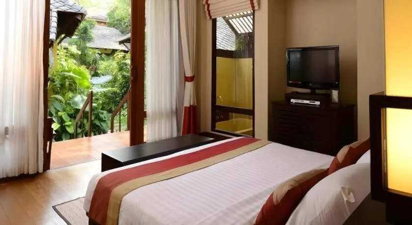 Bed in Baan Talay Dao Resort