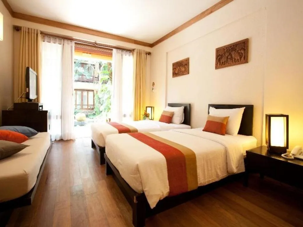 Bed in Baan Talay Dao Resort