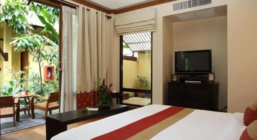 Bed in Baan Talay Dao Resort