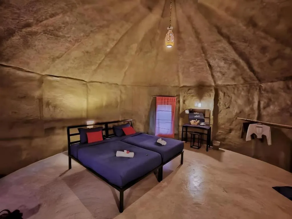 Bed in Avartarn Miracles Hotel